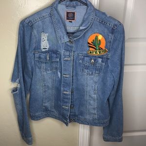Distressed jean jacket with sequin patches